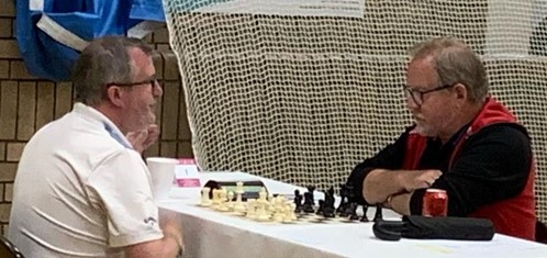 Open winner GM Matthew Turner (left) vs Paul Hutchinson